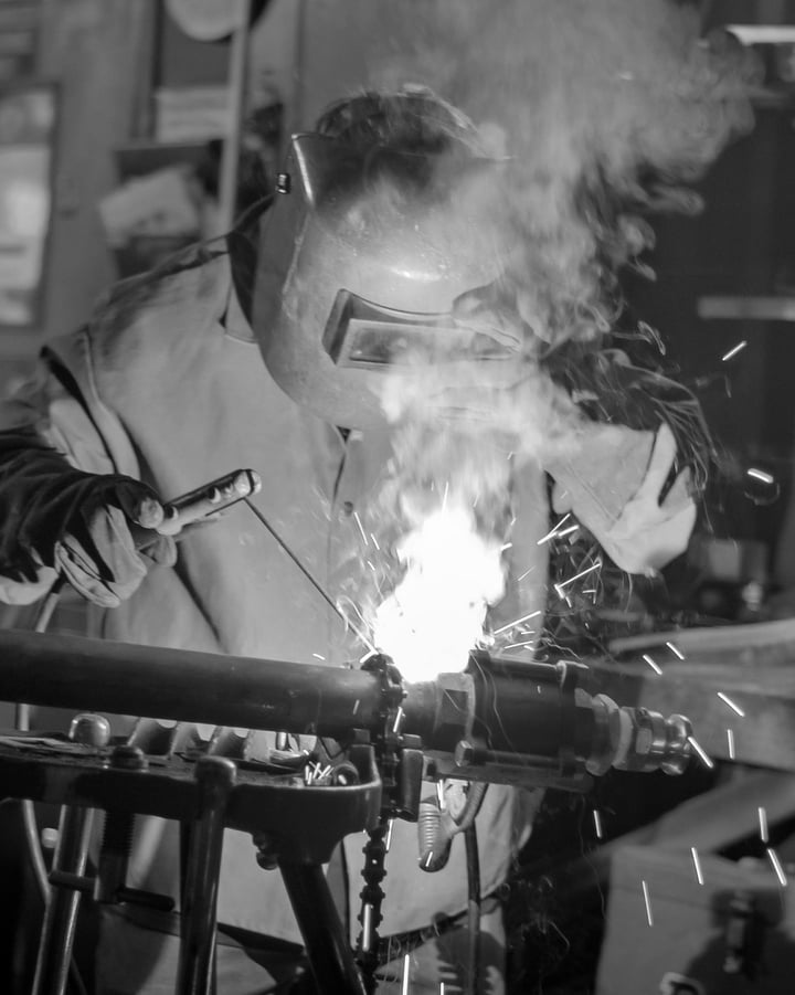A person doing some welding A person doing some welding